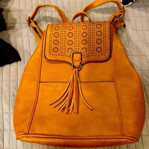 Cognac/Tan faux leather backpack purse NWOT and never carried. Smoke free home